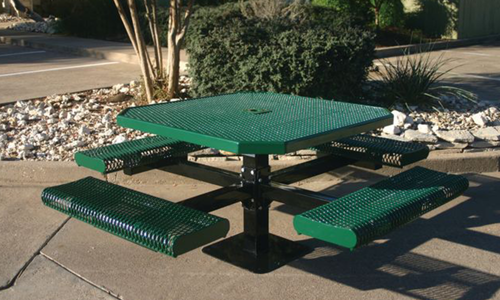 Green expanded metal pedestal picnic table with surface-mounted frame for commercial parks, schools, and outdoor dining spaces